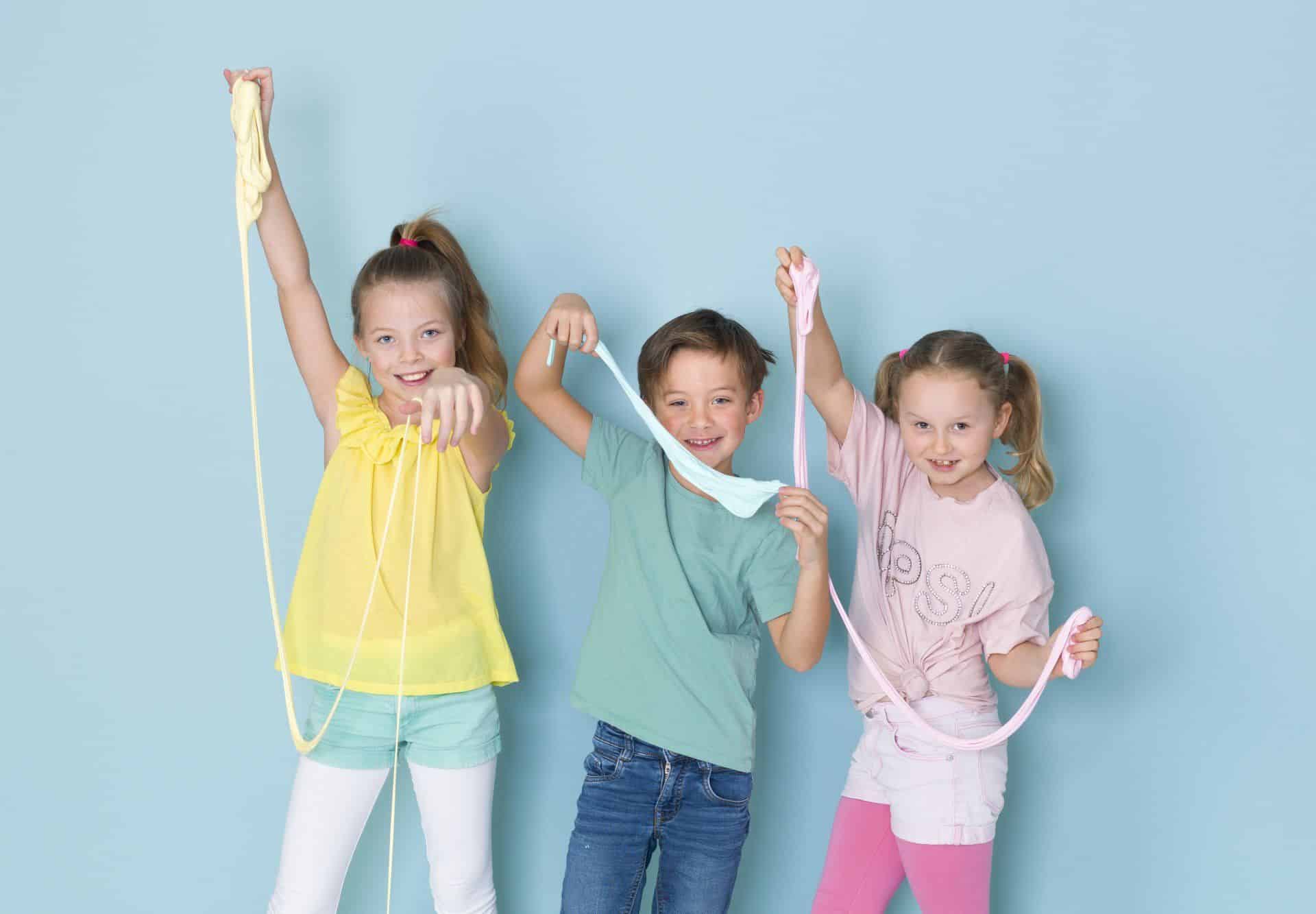 3 children playing with slime
