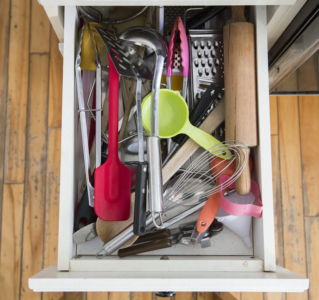 21 Things in Your Home You Should be Throwing Out 12 A cluttered kitchen drawer. Search your drawers for things in your home you should be throwing out.