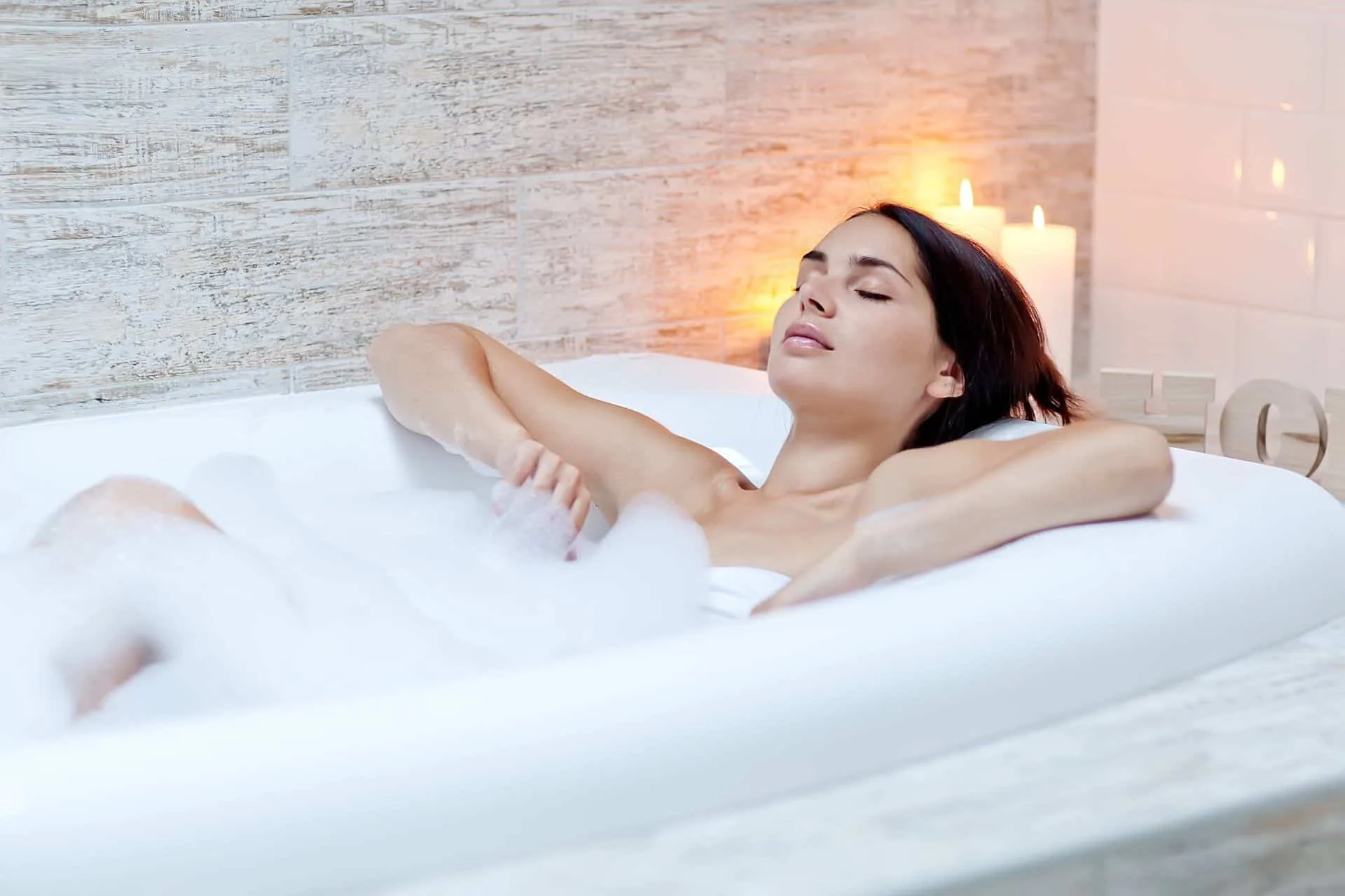 There is a Right Way to Scrub-A-Dub Your Tub 2 A woman in a freshly cleaned bathtub