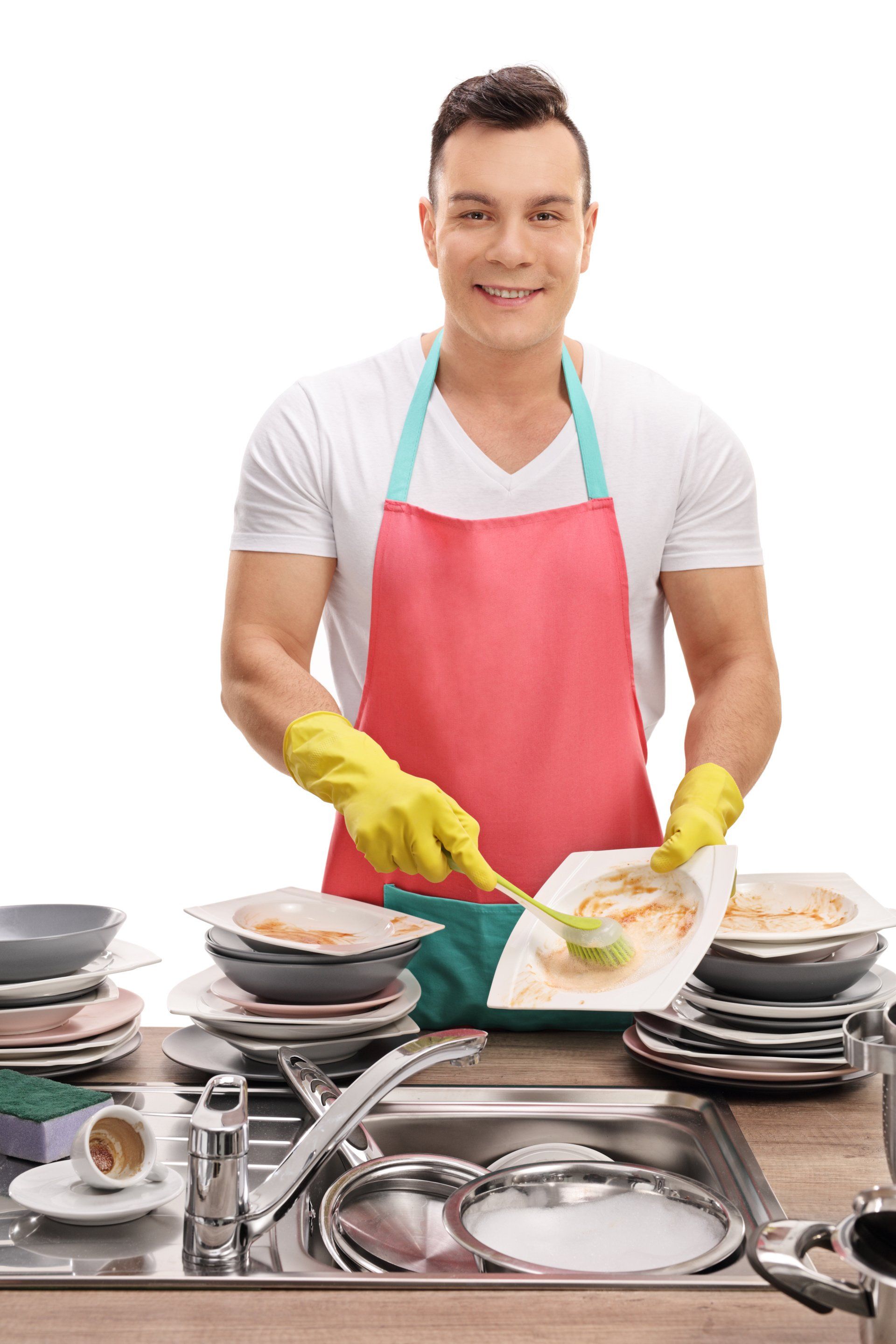 man smiling and doing dishes