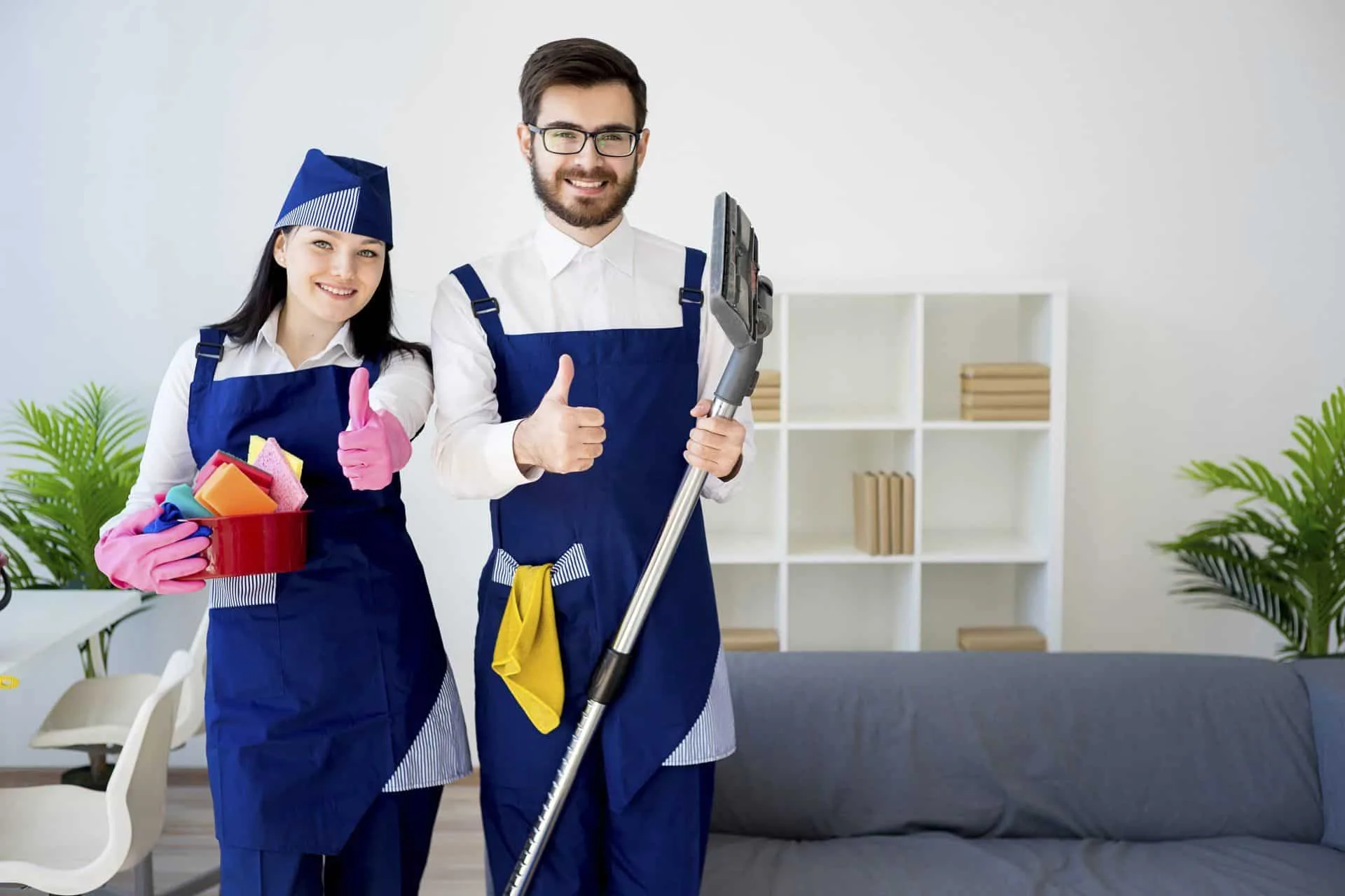 Cleaning with TLC: Your partner in sanitation during COVID-19 6 two smiling cleaning professionals