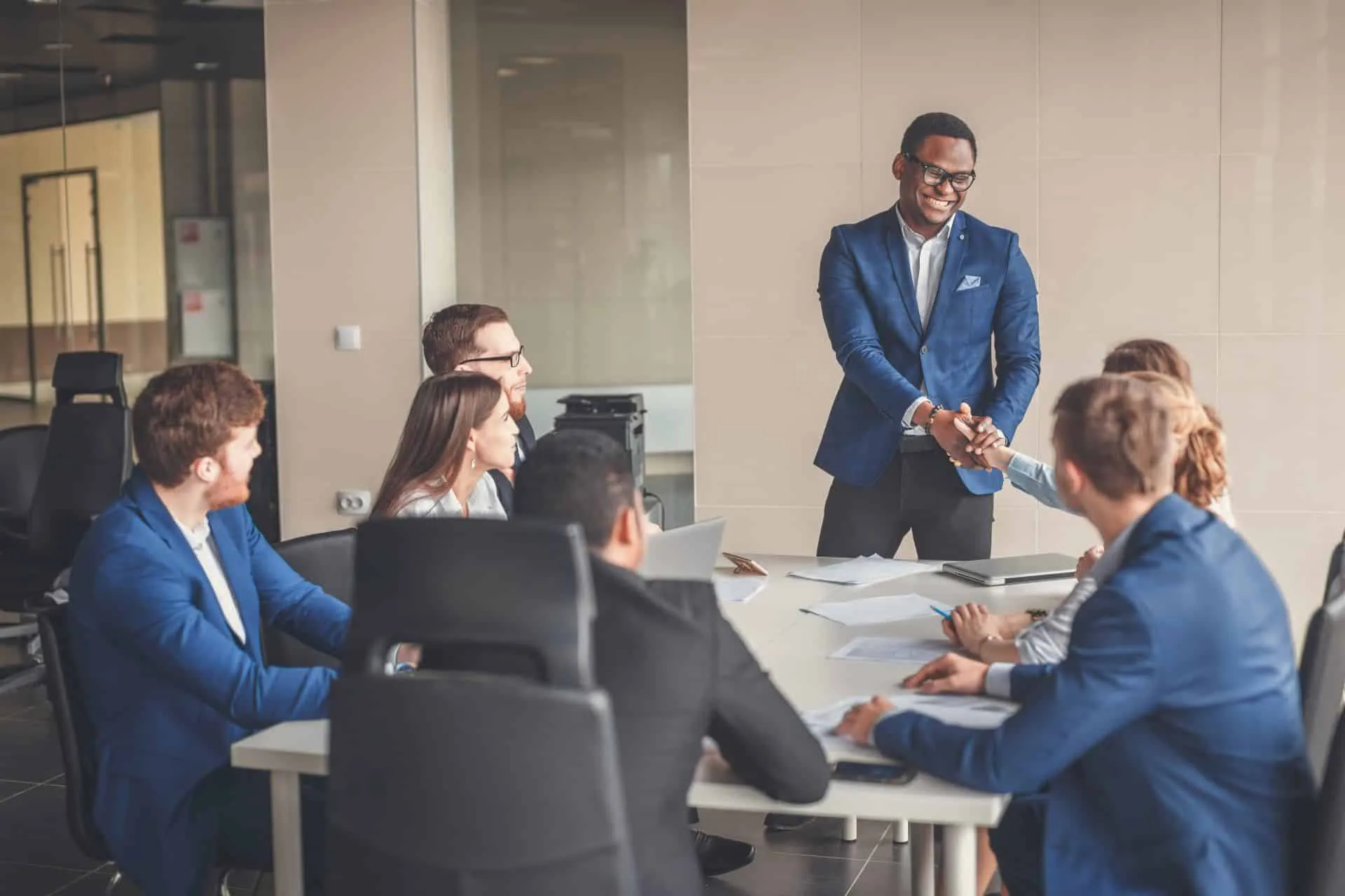 Why Your Office Needs a Commercial Cleaning Service 15 man shaking the hand of a woman at a business meeting