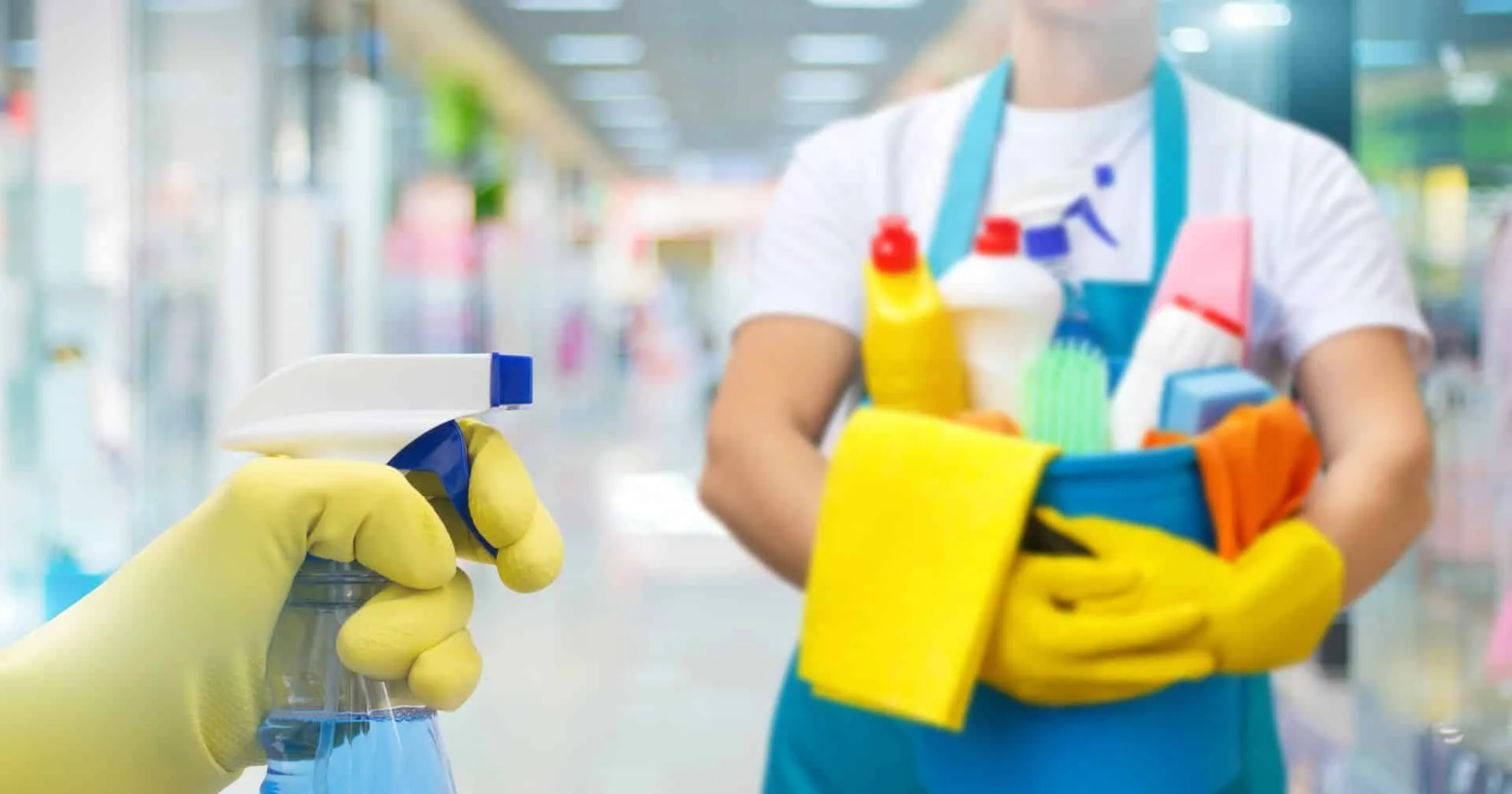 What's the Difference Between Cleaning, Disinfecting and Sanitizing? 13 someone holding a bucket of cleaning tools and supplies