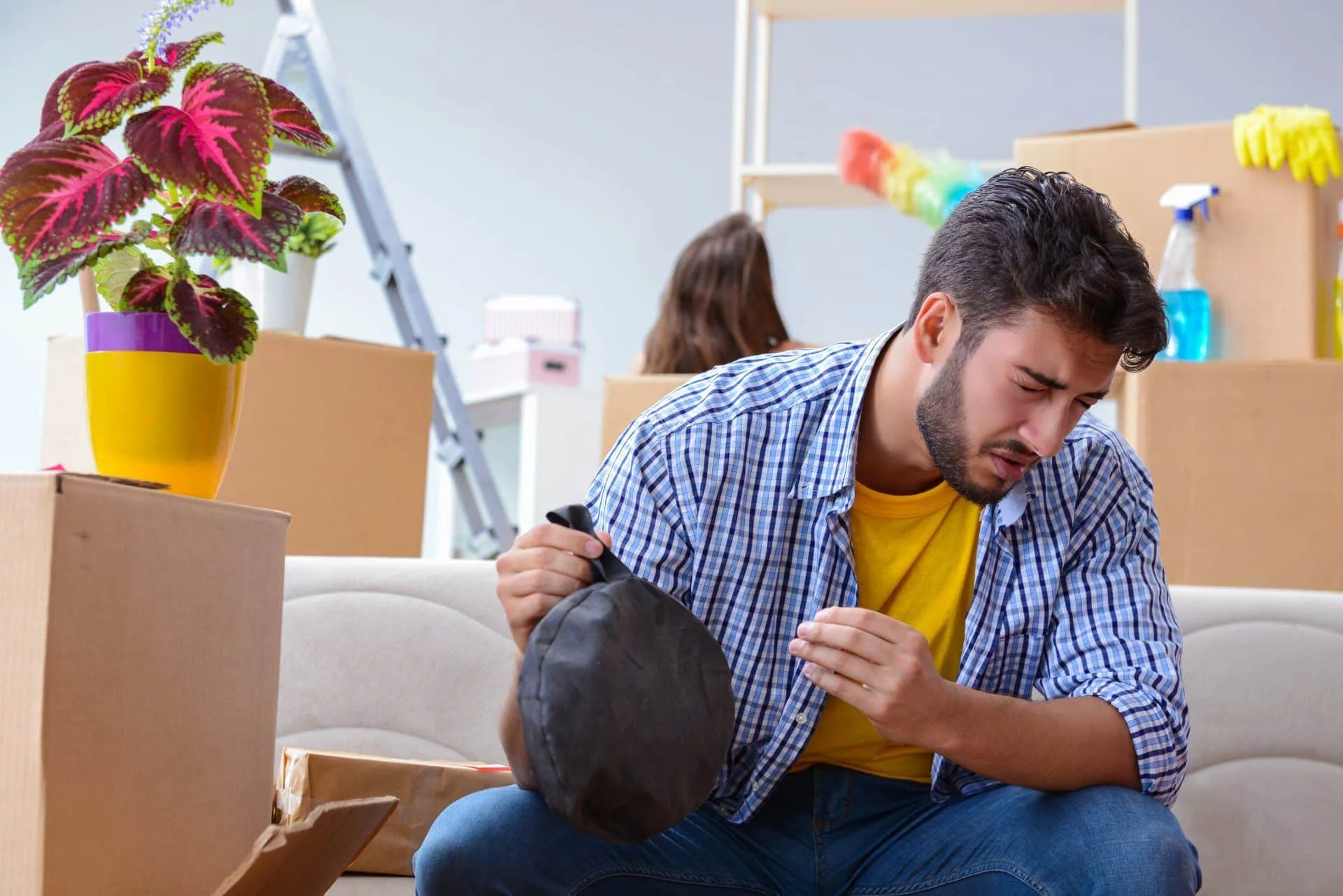 How to Have the Best Smelling House on the Block 43 man holding a whoopie cushion with a look of detest on his face
