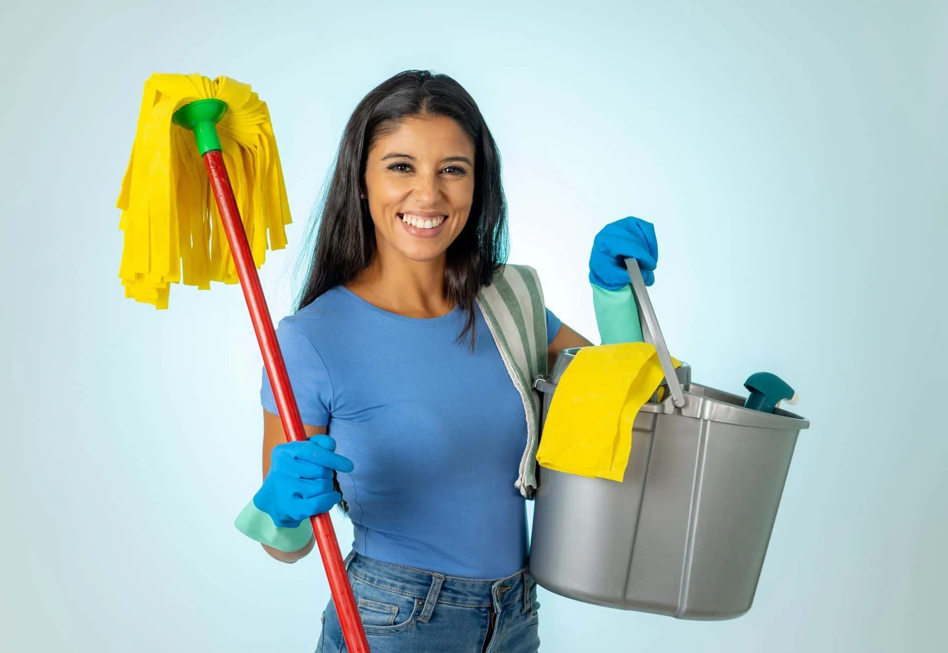 Time To Purge: Ways to Declutter and Reorganize 6 a professional cleaner holding cleaning supplies
