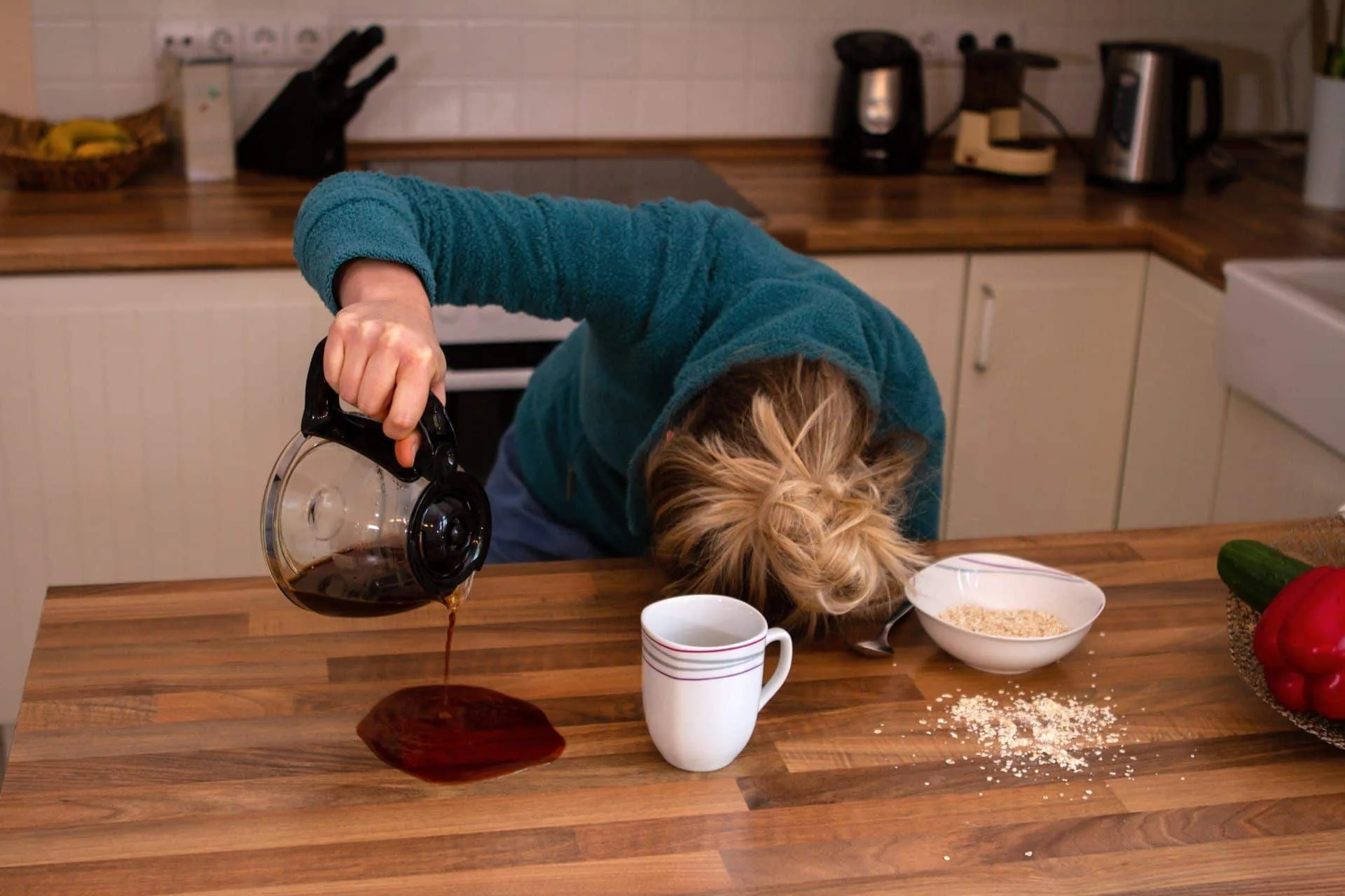 How to Remove Set-In Stains in Your Carpet 16 blonde woman in robe pouring coffee on to counter and missing her glass