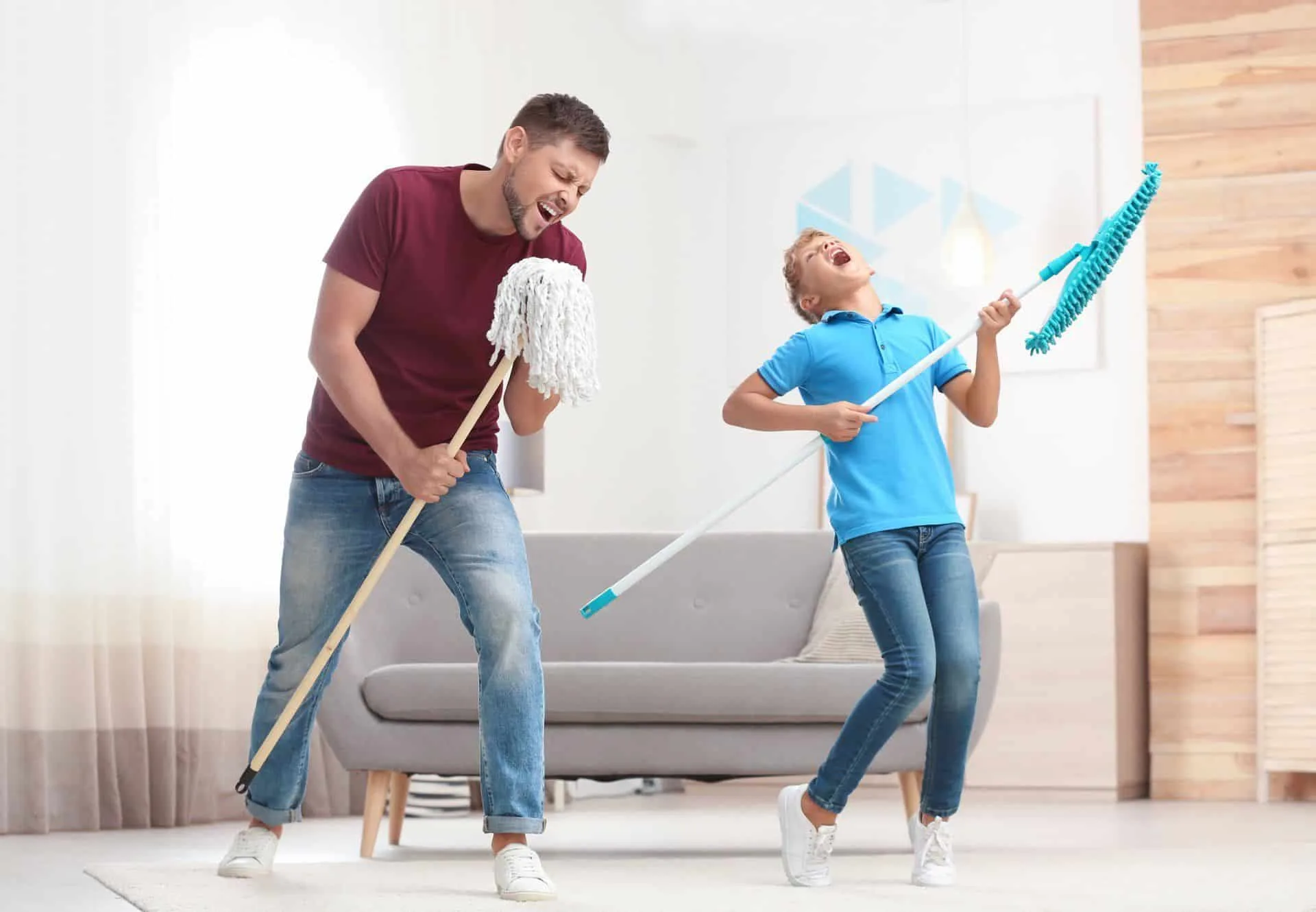 How Often You Should Really Be Dusting Your Home 5 father and son having fun while sweeping and mopping