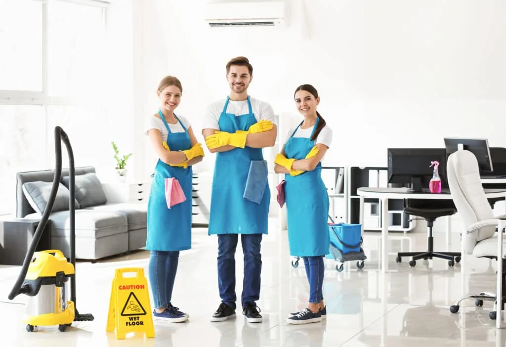 How to Clean Baseboards 13 A smiling cleaning crew