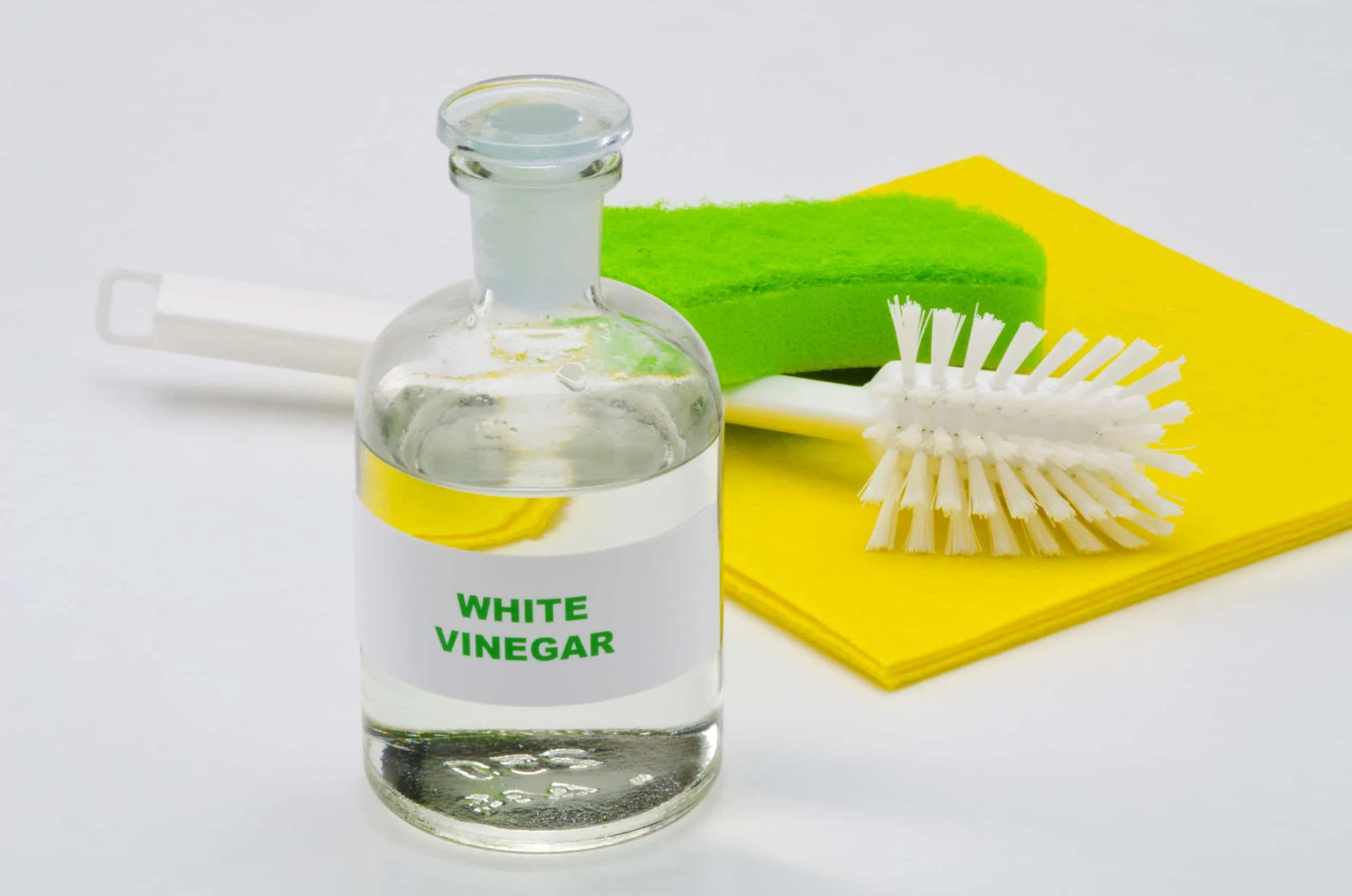 How to Clean a Shower Head 5 White vinegar and cleaning supplies