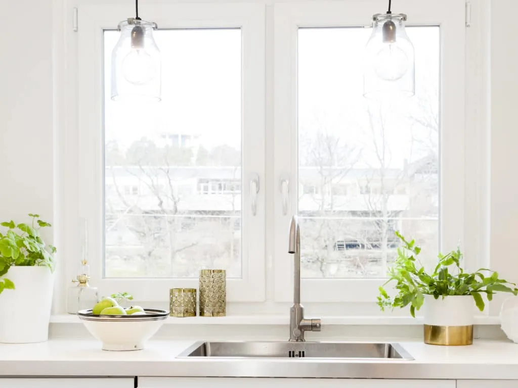 How to Clean a Glass Stovetop 5 A window above a kitchen sink