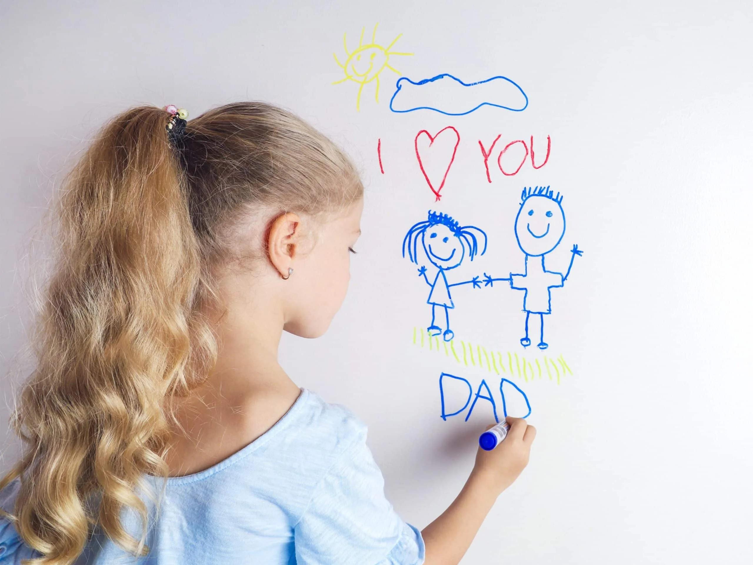 How to Get Crayon Off the Walls 5 A girl drawing on a wall with marker