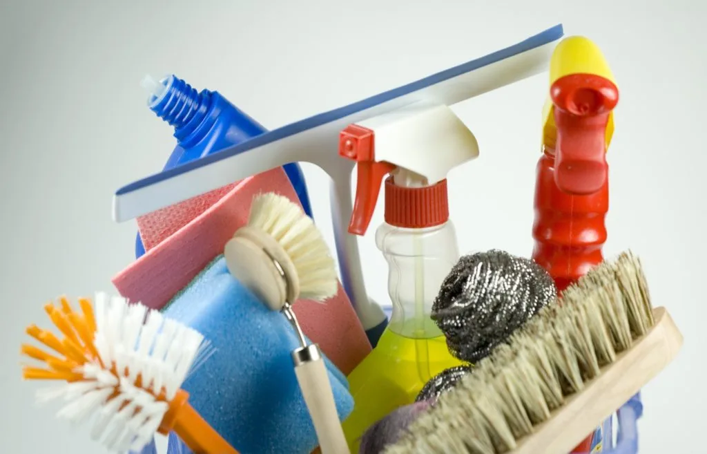 How to Clean Your House Cleaning Tools 2 A bucket filled with house cleaning tools.